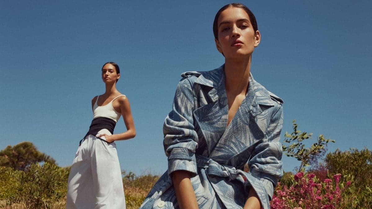 Models in a white two-piece and a blue leaf-print trench coat, outfit inspiration for a Paris photoshoot by SabShots